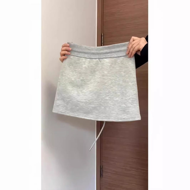 Sports and casual short skirt for women with large size fat m pear type high waist pack hip A-line gray skirt with small drawstring