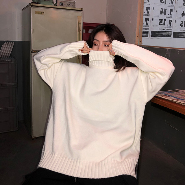 Black sweater female inside the autumn and winter new retro Hong Kong flavor BF lazy style loose outer piercing high -necked sweater