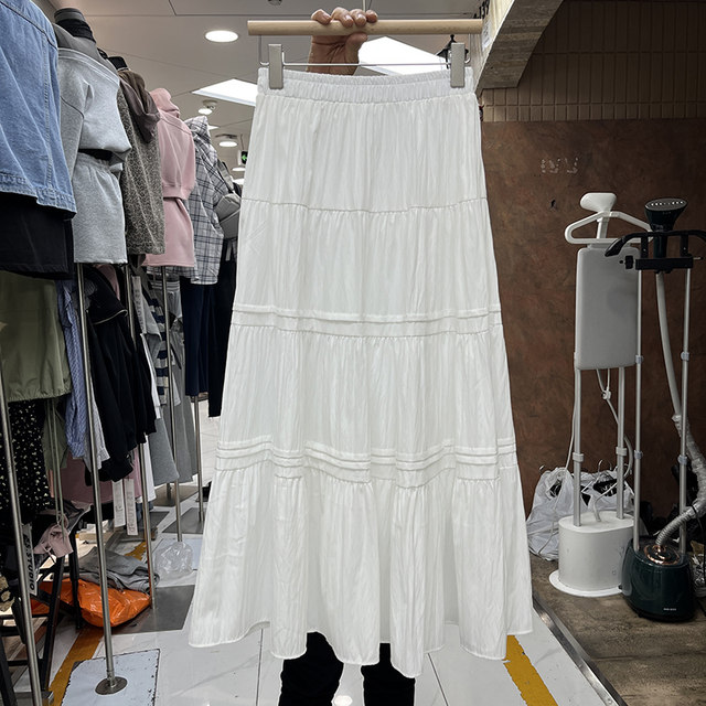 Forest sweet solid color spliced ​​and pleated A-line skirt for women 2025 spring new mid-length fluffy cake skirt
