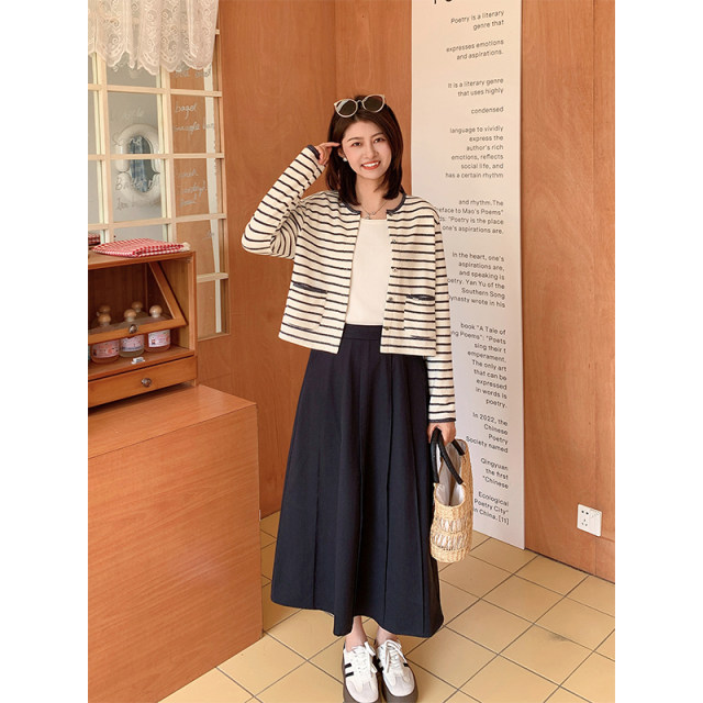 Zilulai is free and flowing ~ Simple and versatile commuting mid-length pressed A-line slim umbrella skirt skirt spring 869X