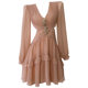 
French niche fashion 2025 design sense hollow rhinestone champagne powder long sleeve V-neck waist-hugging vacation dress for women