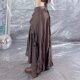 Find European and American large size retro style irregular wood ear design long skirt for women, vacation new long skirt