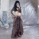 Find European and American large size retro style irregular wood ear design long skirt for women, vacation new long skirt