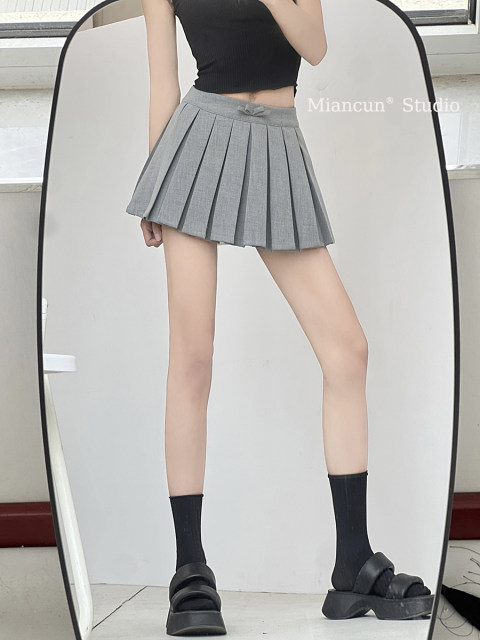 Low -waist college wind band bow pleated skirt miu is a girl sweet girl anti -walking half -body mini skirt
