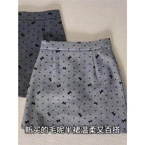Sweet atmosphere bow skirt for women new autumn and winter thick wool A-line skirt high-waisted hip short skirt
