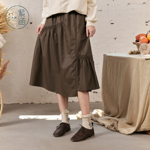 Zihan irregular stitching PU leather skirt women autumn new retro Mirad casual high waist A -line skirt
