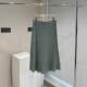 Clearance knitted skirt women in autumn and winter clearance leakage women's middle -long skirts, buttons, butt skirts
