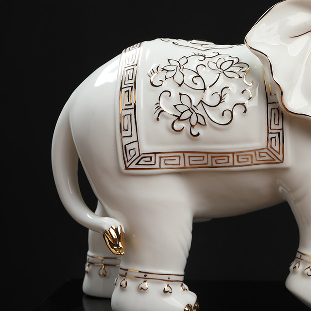 Chinese white ceramic elephant ornaments, a pair of high-end housewarming and opening gifts, living room wine cabinet, desktop fortune-enhancing decorations