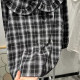 Early autumn new women's black and white plaid thin foam cotton doll collar nine-point sleeve age-reducing cotton women's top is large size