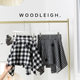 Spring new black and white plaid one-piece lace-up skirt straps covering the cross dance irregular tweed warm skirt
