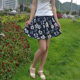 New spring and summer fresh cotton and linen short skirt puffy skirt commuter versatile linen printed beach big sling skirt