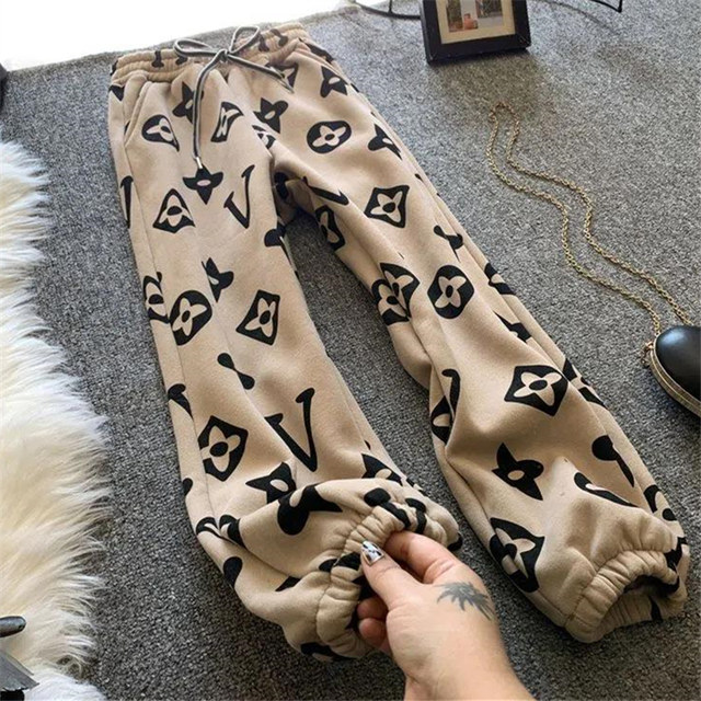 Clearance counter has withdrawn extra large size fat mm 300Jin [Jin is equal to 0.5kg] plus velvet and thickened printed wide-leg pants for women