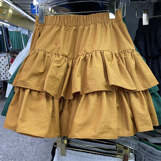 2025 new fluffy skirt short skirt solid color high-waisted skirt ruffled A-line skirt versatile to make you look slim and cover your flesh casually

