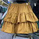 2025 new fluffy skirt short skirt solid color high-waisted skirt ruffled A-line skirt versatile to make you look slim and cover your flesh casually
