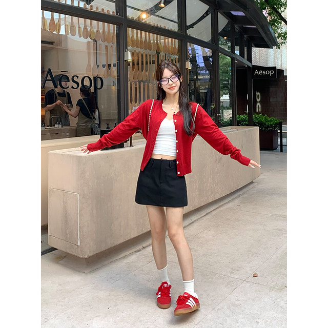 Adan versatile miu style skirt spring and autumn Korean style versatile high waist slim commuting black temperament A-line short skirt for women
