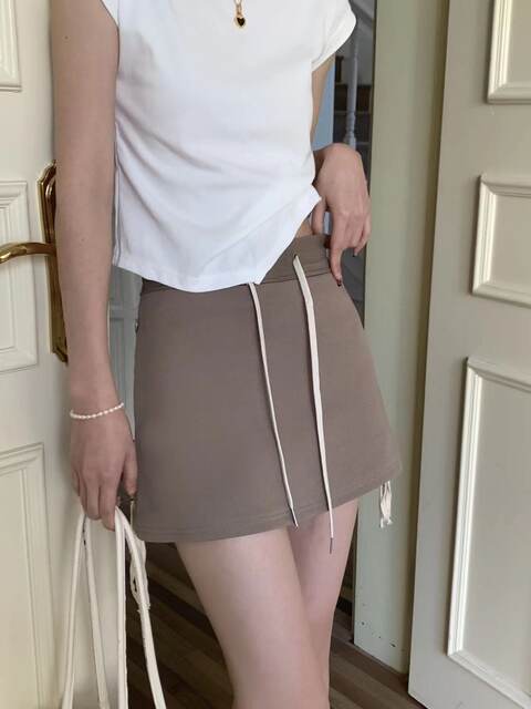 Pocket drawstring Sports Halway Skirt Female Spring New High Limin Short Aid A -line hip short skirt Besides
