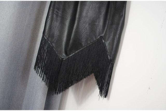 High-waisted hip mid skirt for women in autumn and winter fashion versatile simple irregular tassel slim skirt leather skirt