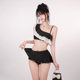 Hot girl's black and white contrasting one-shoulder ruffled skirt bikini, high-end pure lust style and beautiful resort swimsuit