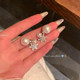 Autumn and winter back-hanging flash zirconium snowflake pearl earrings for women, high-end niche temperament earrings, unique Christmas earrings