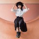 The Japanese literary autumn and winter slim pleated skirt with black lace-up style versatile mid-length A-length skirt