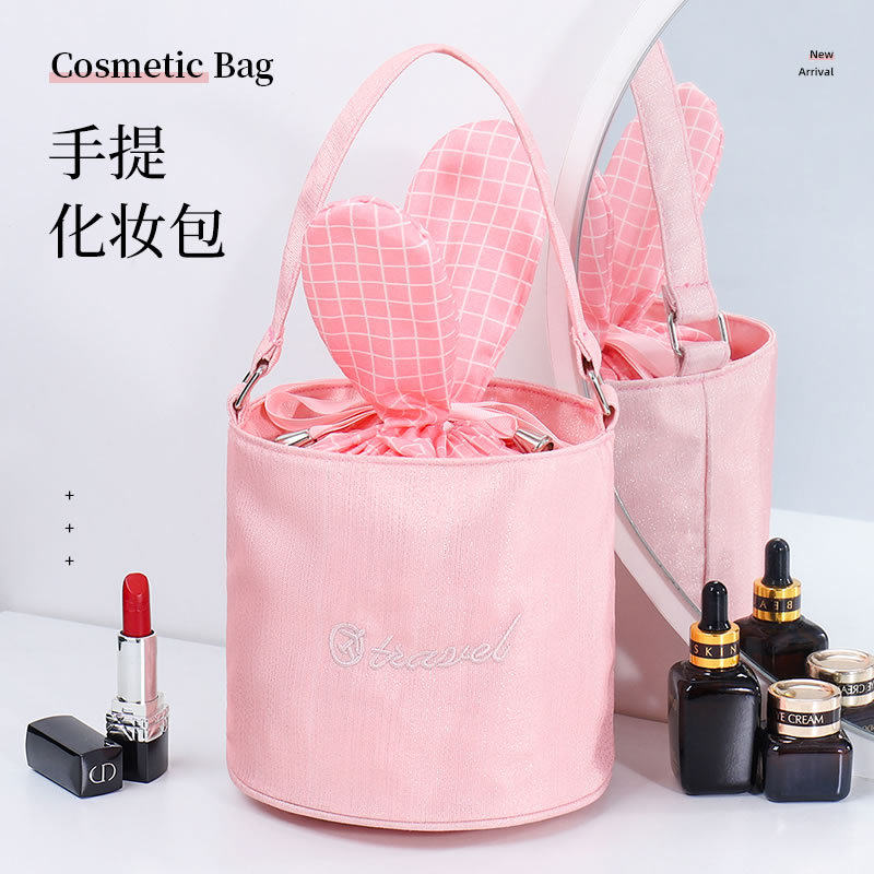 Lazy net red makeup bag 2021 new super-hot sweet lady portable small large-capacity bucket storage bag