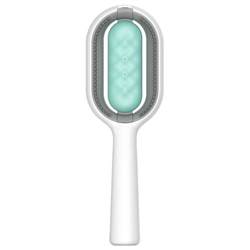 Pet gravitational comb brush removes the hair artifact cat comb
