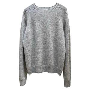 Fine rice custom 100% full wool seamless round neck pullover knit sweater solid color versatile slim sweater for women