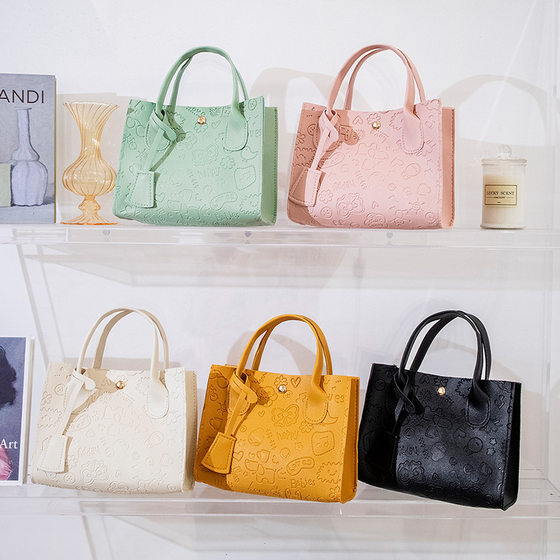 2022 Spring New Tote Bag Shoulder Bag Korean Street Trend Version Bag Women's Embossed Handbag One Piece