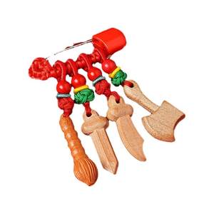 
Putuoshan birth year baby outing pin pregnant woman G tooth mahogany sword brooch safety amulet