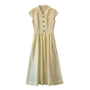 
Fortunately, I made myself under the pear tree. Small French elegant light yellow shirt collar commuting retro dress summer