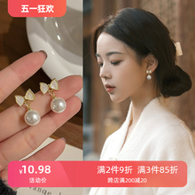 Elegant bow, pearl style earrings, niche