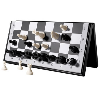 
Primary school students with magnetic chess foldable chess board
