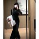 French Hepburn Wind Black slightly transparent base knitted dress women's winter slim inside hip fishtail long skirt
