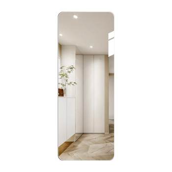 Simple custom-made full-length mirror mounted on the wall