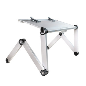 
OMAX lying on the bed with a computer desk lying on the computer office laptop folding stand lying on the bed and reading artifact