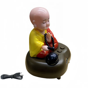 
Solar monk shaking his head car ornaments charging novice car center console automatic wooden fish car interior decoration