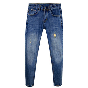 
Seiko washed nine-point jeans for men, blue trendy versatile fake holes, scratched elastic slim fit pencil pants for men
