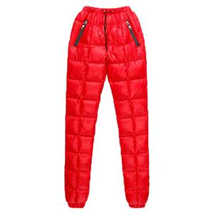 
Couple Northeast thickened outdoor down pants for men and women wearing high-waisted warm winter white duck down cotton pants for minus 40 degrees