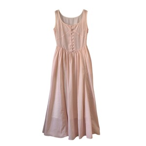 
Fortunately, I made my own Sonnet, a small classic waistline French plaid orange and pink vest lace-up dress for summer.