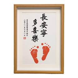 Peaceful and joyful baby is born after full month with hand and foot prints