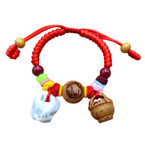 
Baby and child peach pit pig bone pressing bracelet peach wood basket purple gold cinnabar bead newborn red rope bracelet