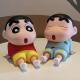 ຜູ້ຖືໂທລະສັບມືຖື Crayon Shin-chan ຖ່າຍທອດສົດ selfie lazy ອິນເຕີເນັດຄົນດັງ anime ເຄື່ອງປະດັບ doll ງາມນັກຮຽນເບິ່ງໂທລະພາບ