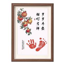 Baby's one-year-old hand and foot prints and full moon commemorative gift box