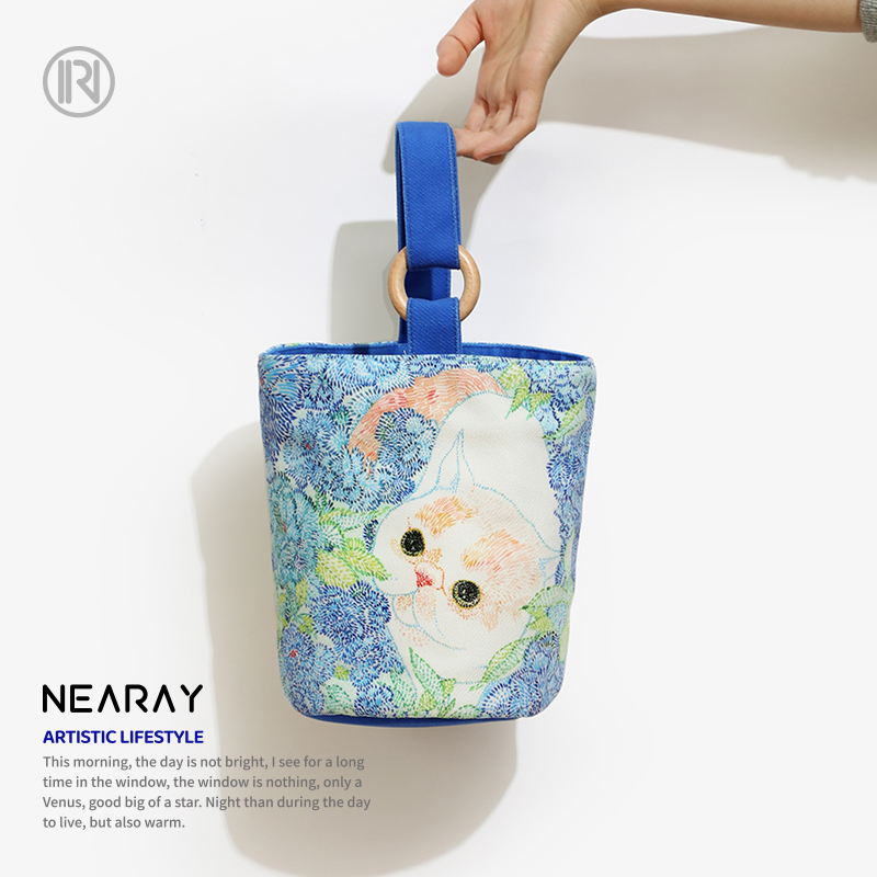尼睿x里拾 可爱猫咪水桶包原创新款帆布包大容量手提包艺术手拎袋