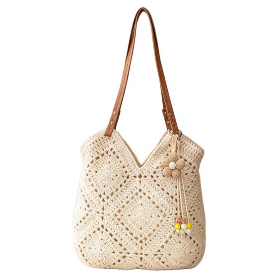 
Apricot color hollow woven tote bag women's large capacity commuter shoulder bag vacation style seaside beach bag straw woven bag