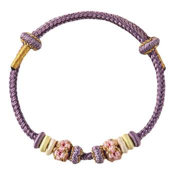 The core can be worn with beads and woven peach blossom rope