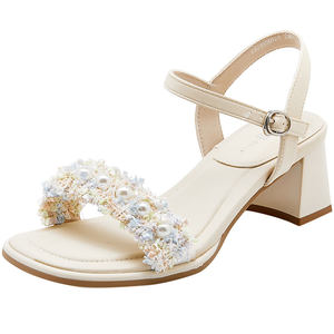 
Dadong women's shoes 2026 summer new fashion commuter one-word buckle elegant high-heeled pearl women's sandals comfortable