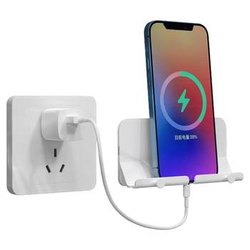 Wall-mounted mobile phone holder without punching multifunctional storage rack