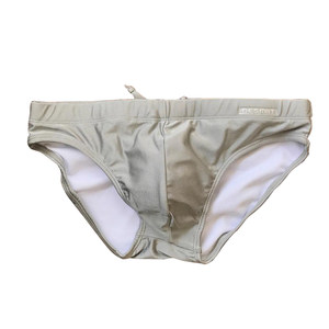 Swimming trunks Men's sexy pure color low -waist anti -embarrassing triangle sand beach seaside vacation hot spring swimming trunks tide swimsuit
