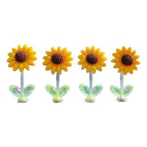 
New desktop ornaments Internet celebrity shakes his head sunflower cute car ornaments car center console sunflower accessories